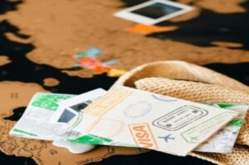 A-number-of-documents-on-a-table-including-a-visa