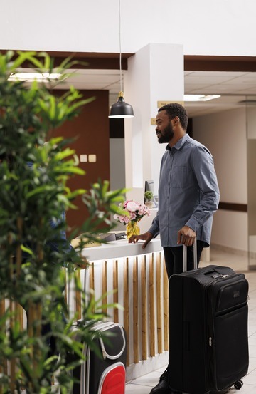 african-american-guy-check-out-hotel