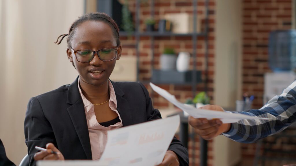 team-african-american-colleagues-processing-legal-documents